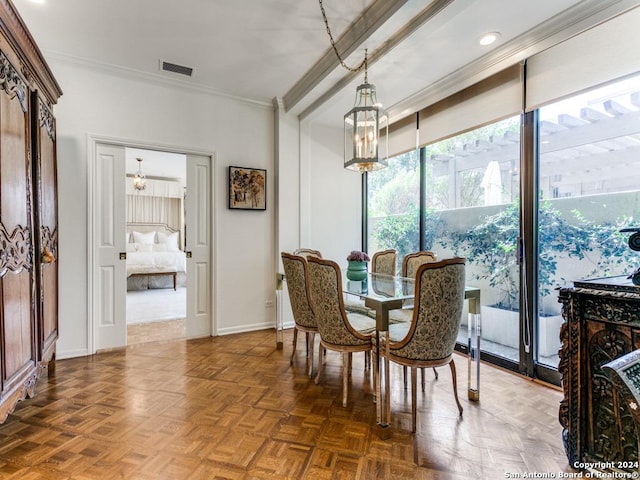 dining room featuring crown molding and dark parquet floors