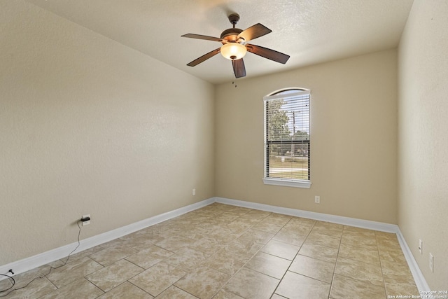100 Vintage Ranch Cir, La Vernia, TX 78121 - empty room with a ceiling fan and baseboards