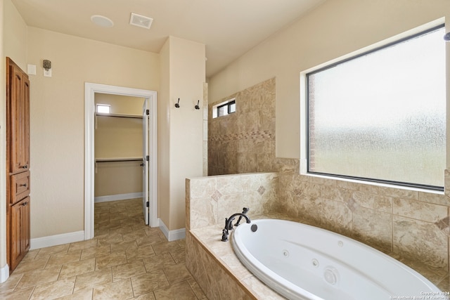 bathroom with independent shower and bath