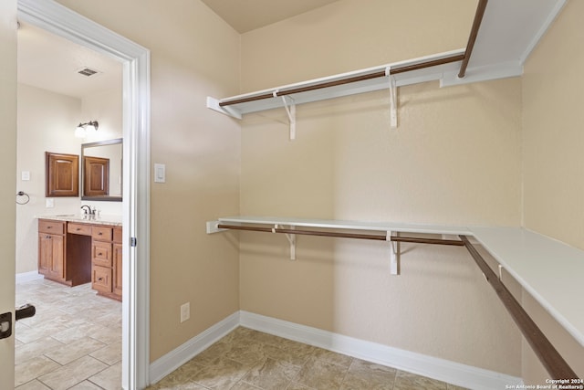 spacious closet with sink