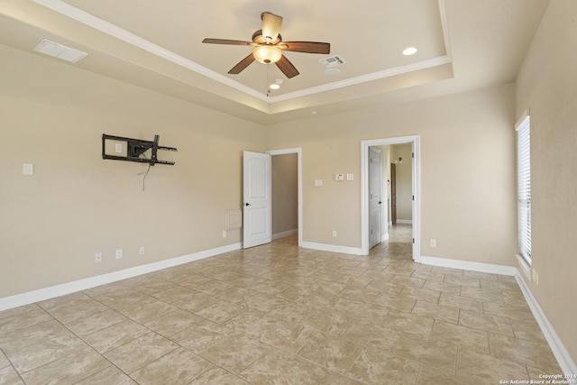 100 Vintage Ranch Cir, La Vernia, TX 78121 - empty room with ceiling fan, a tray ceiling, ornamental molding, baseboards, and recessed lighting