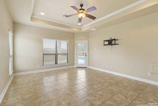 100 Vintage Ranch Cir, La Vernia, TX 78121 - spare room featuring a tray ceiling, ceiling fan, crown molding, recessed lighting, and baseboards