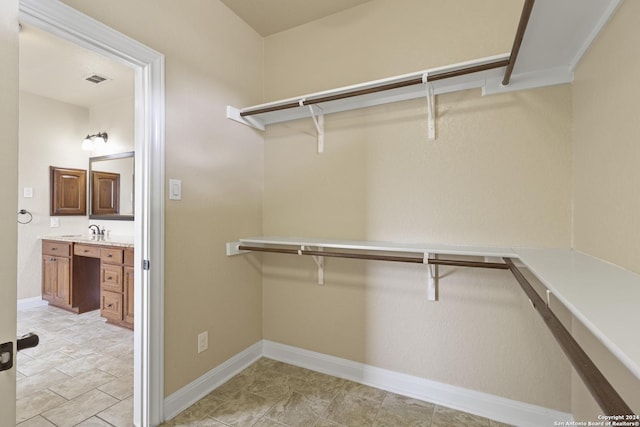 100 Vintage Ranch Cir, La Vernia, TX 78121 - spacious closet featuring a sink