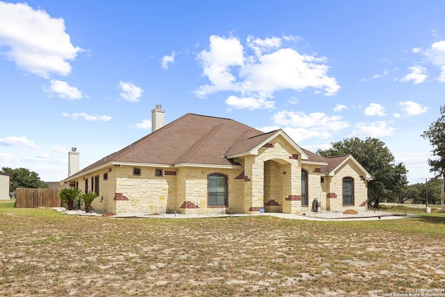 100 Vintage Ranch Cir, La Vernia, TX 78121 - french provincial home with stone siding and a chimney