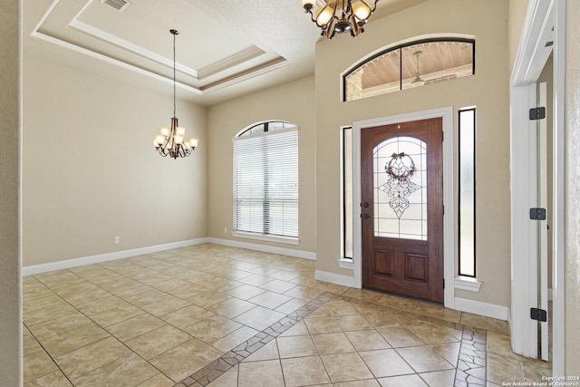 100 Vintage Ranch Cir, La Vernia, TX 78121 - entryway featuring a chandelier, plenty of natural light, and baseboards