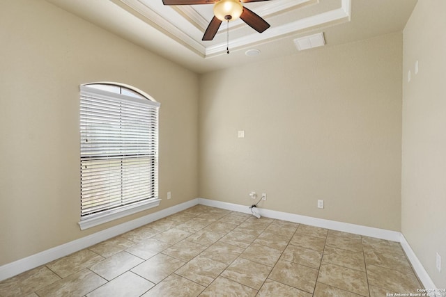 100 Vintage Ranch Cir, La Vernia, TX 78121 - spare room featuring a tray ceiling, ceiling fan, and baseboards