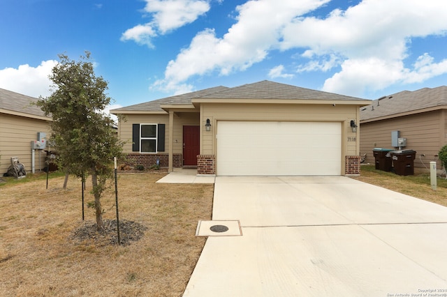 view of front facade with a garage and a front yard