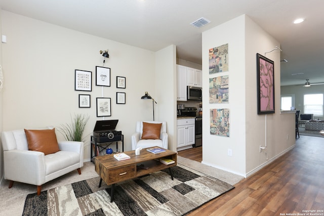 living room with dark wood-type flooring