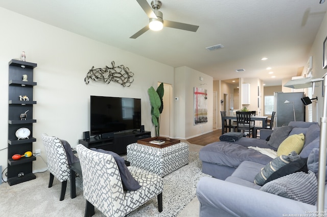 living room featuring ceiling fan