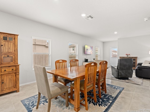 dining room featuring light tile patterned flooring