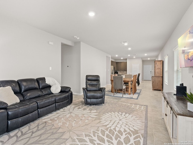 living room with light tile patterned flooring