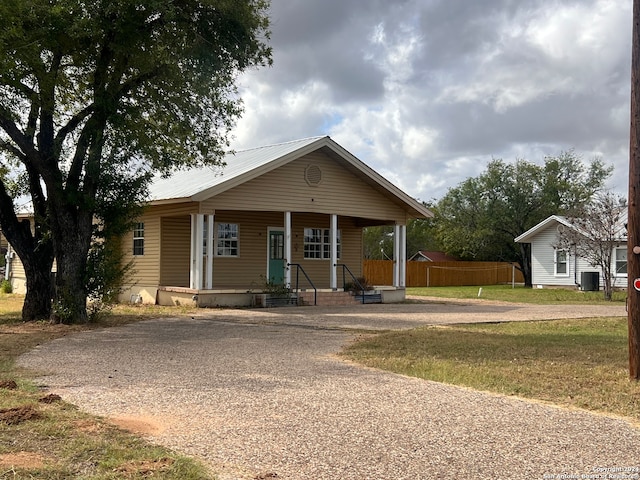 view of front of home featuring covered porch