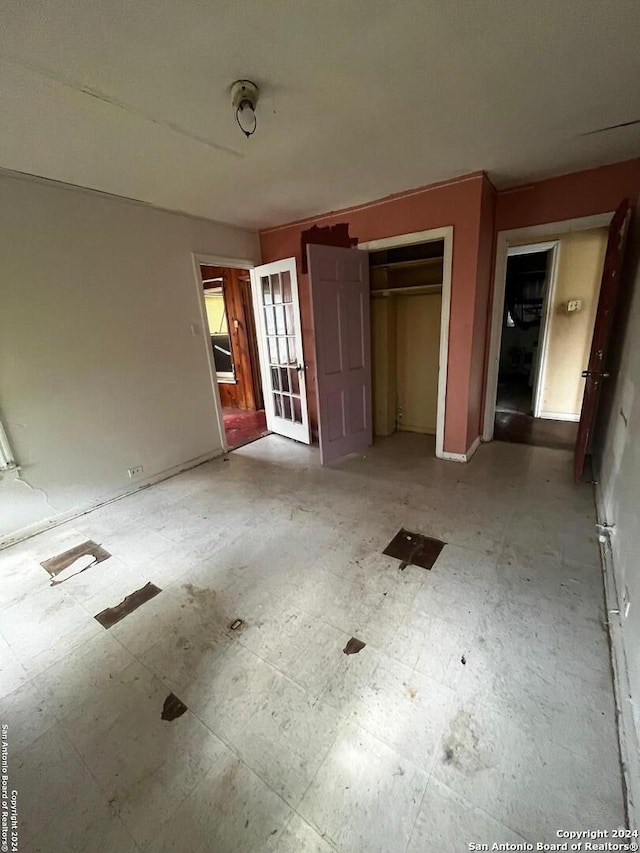 unfurnished bedroom featuring a closet