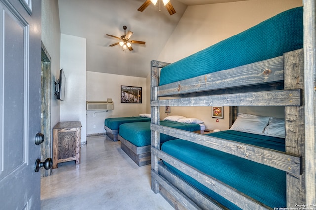 bedroom featuring ceiling fan, concrete flooring, high vaulted ceiling, and a wall unit AC