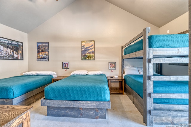 bedroom featuring high vaulted ceiling