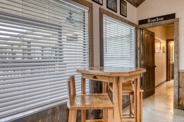 dining space with concrete flooring