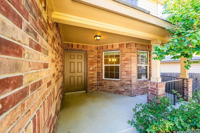 entrance to property with a patio