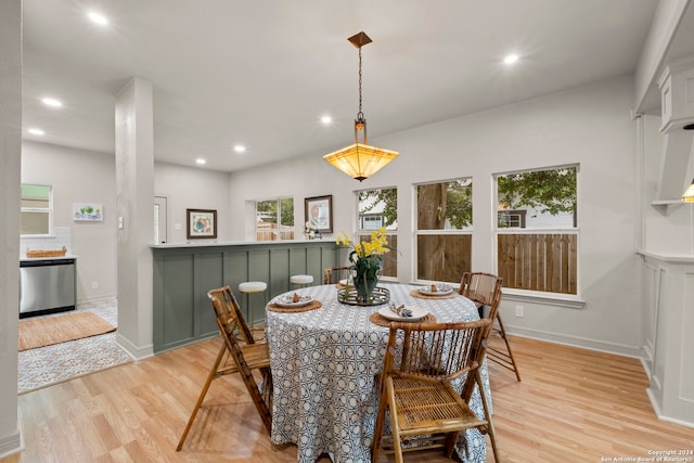 dining space featuring light hardwood / wood-style flooring