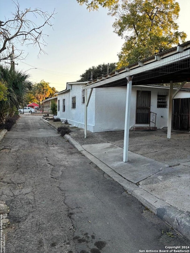 view of property exterior at dusk