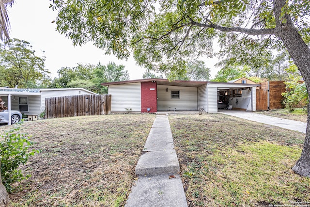 view of front of property with a carport