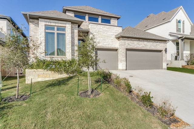 prairie-style home featuring a front yard