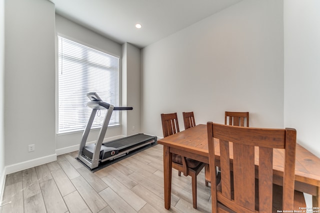 exercise area with light wood-type flooring