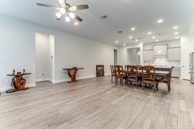 216 Paint Crk, Boerne, TX 78006 - dining space with ceiling fan, light wood-type flooring, recessed lighting, and baseboards