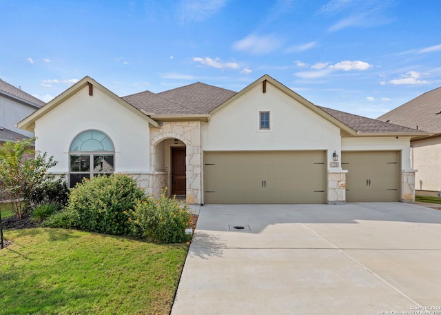 133 Maravillas, Boerne, TX 78006 - view of front of property featuring a garage and a front lawn