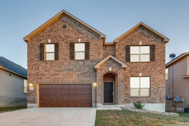 front of property featuring a garage