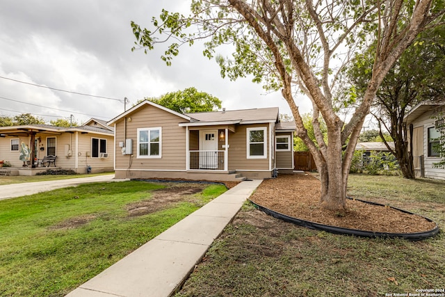 view of front of home with a front yard