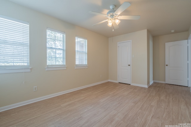 interior space featuring ceiling fan and light wood-type flooring