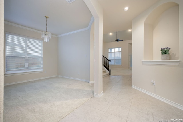 7270 Lunar Eclipse, Converse, TX 78109 - spare room featuring stairway, crown molding, baseboards, a chandelier, and arched walkways