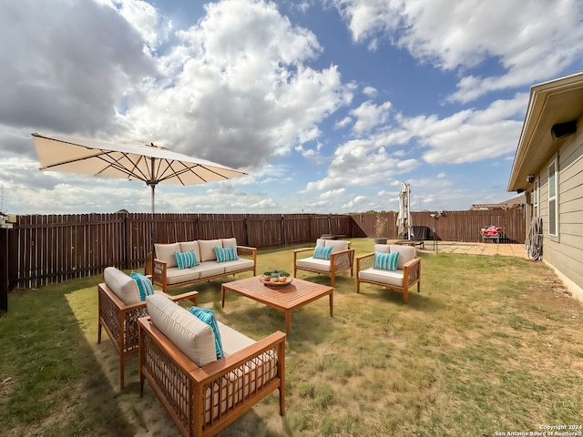 view of yard with outdoor lounge area and a patio area