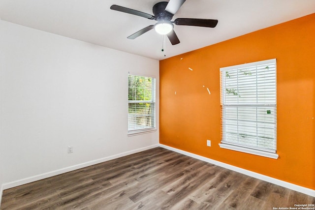 1102 Onslow, San Antonio, TX 78202 - spare room with baseboards, wood finished floors, and a ceiling fan