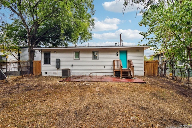 1102 Onslow, San Antonio, TX 78202 - back of house featuring crawl space, a fenced backyard, a patio area, and central air condition unit