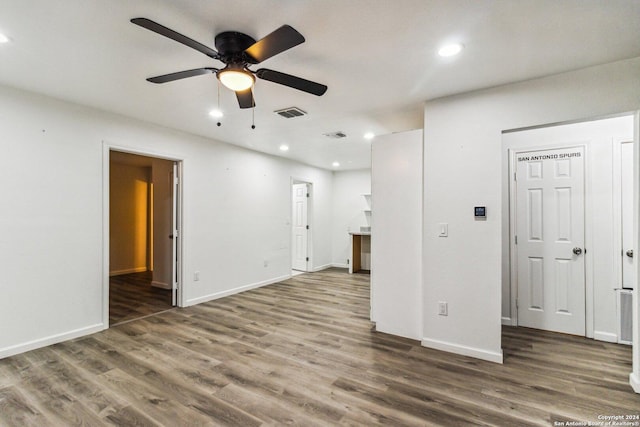 1102 Onslow, San Antonio, TX 78202 - spare room featuring a ceiling fan, wood finished floors, baseboards, and recessed lighting