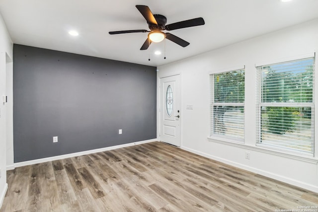 entryway with ceiling fan and light wood-type flooring