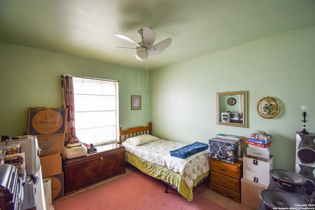 bedroom with ceiling fan and carpet flooring