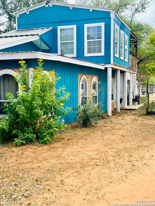 view of front of property with metal roof