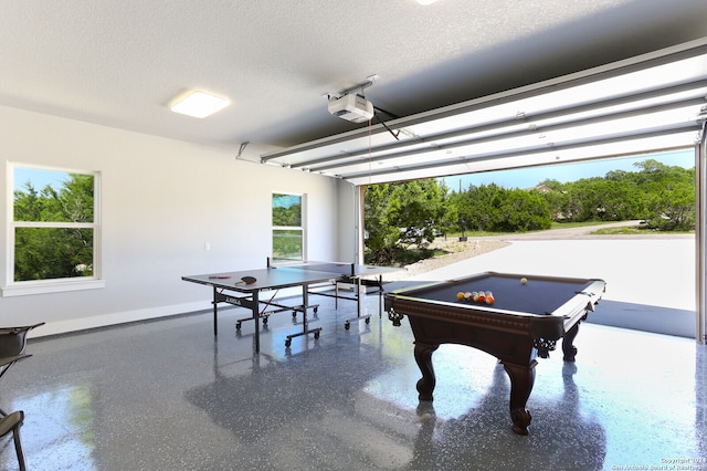 rec room featuring billiards and a textured ceiling