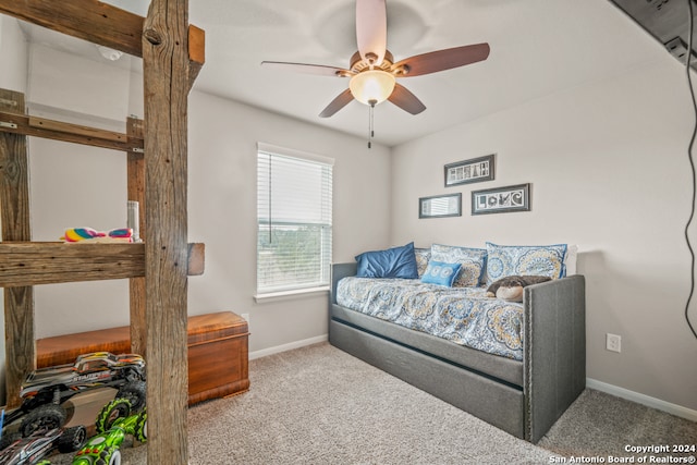 carpeted bedroom featuring ceiling fan