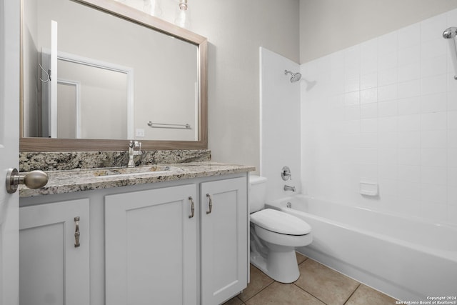 full bathroom with tile patterned floors, vanity, toilet, and shower / washtub combination