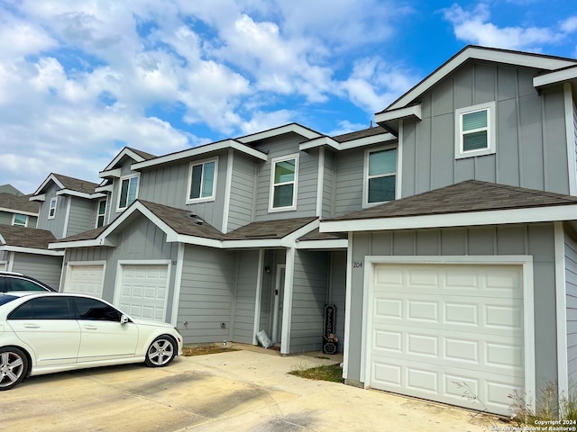 view of front of property with a garage