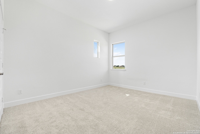 empty room featuring carpet flooring