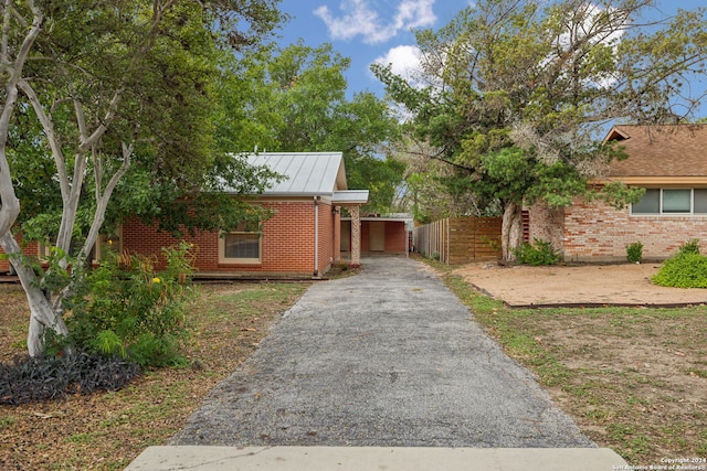 view of yard with a carport