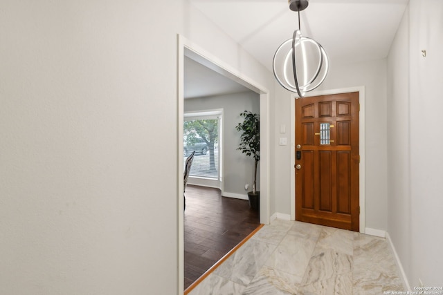 entrance foyer featuring hardwood / wood-style flooring