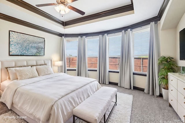 bedroom with ceiling fan, multiple windows, crown molding, and light colored carpet