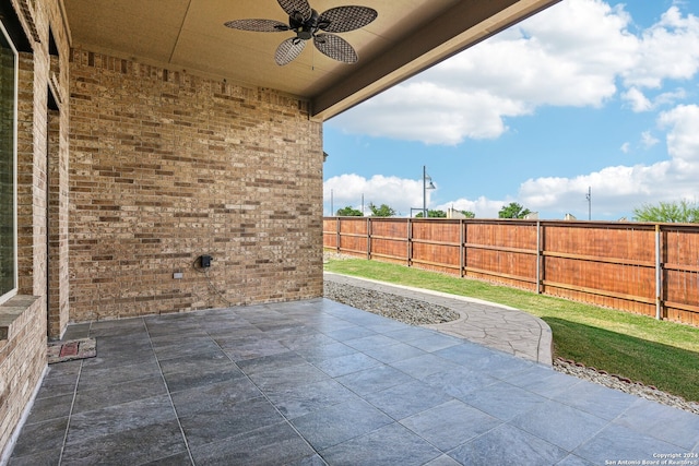 view of patio / terrace featuring ceiling fan