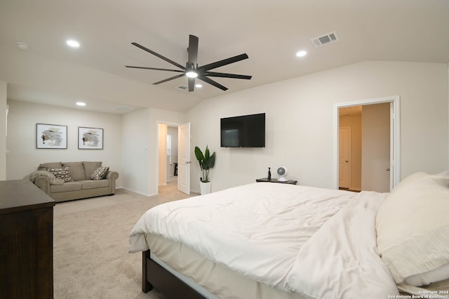 bedroom featuring ceiling fan, lofted ceiling, and light colored carpet