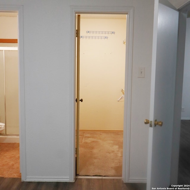 hall featuring dark hardwood / wood-style floors